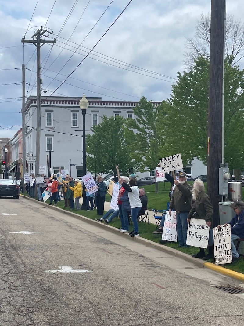 About 40 protesters gathered Saturday, May 3, 2025, and lined the 100 block of North Main Street to express their opposition to current U.S. foreign policy, domestic policy and the separation of powers being tested by the White House.