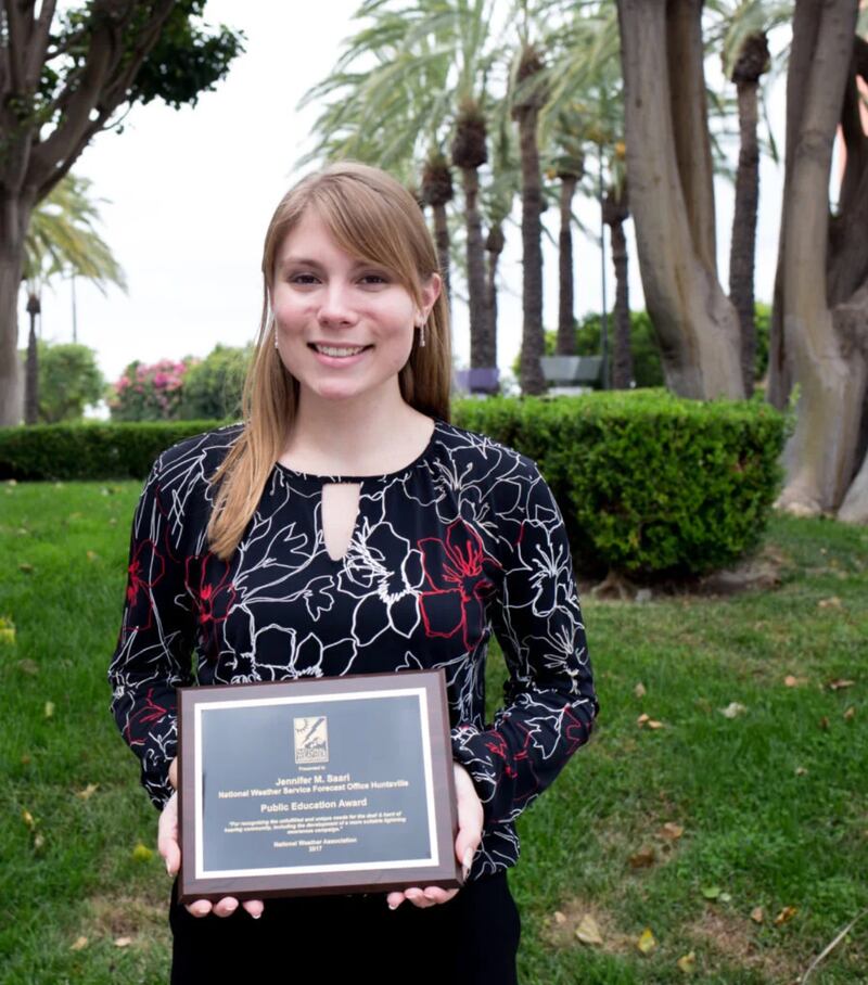 Jennifer Saari after receiving a Public Education Award from the NWS for her work with the deaf and hard of hearing community in 2017.
