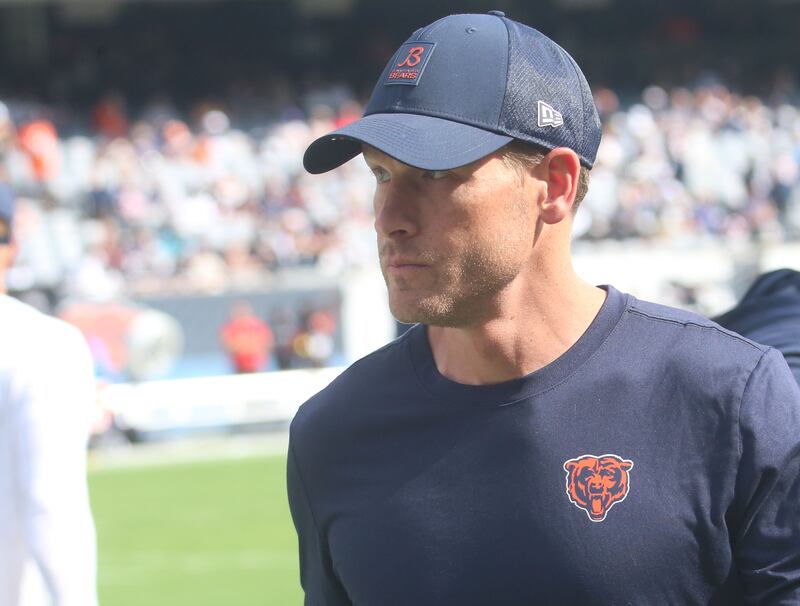 Chicago Bears head coach Ben Johnson walks on the field before the game against the Dallas Cowboys on Sunday, Sept. 21, 2025 at Soldier Field.