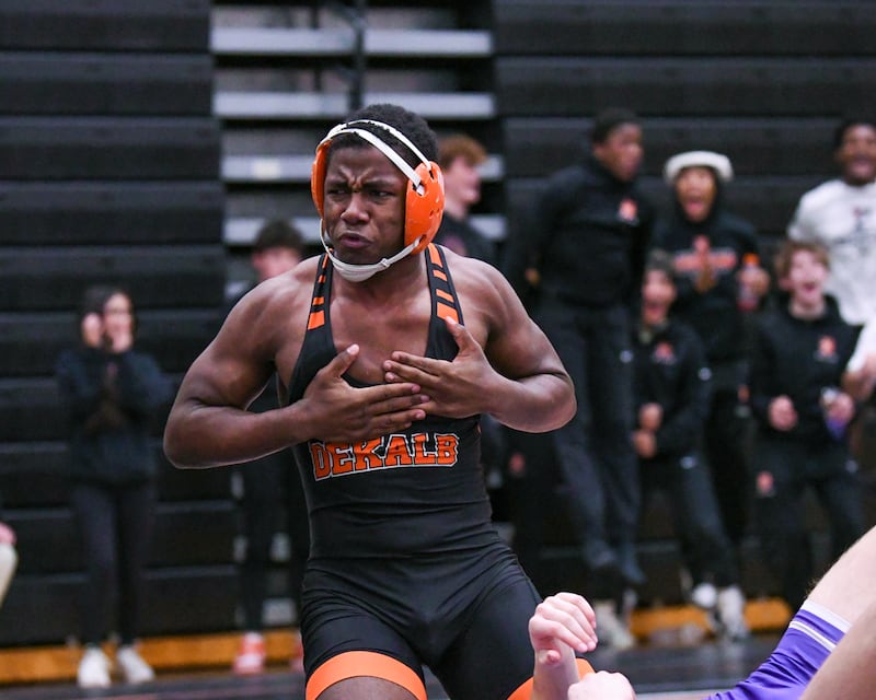 DeKalb’s Hussul Greer celebrates his pin over Hampshire’s John Janicki during the 175-weight class in the third-place regional title match up on Saturday Jan. 31 ,2026, held at Dekalb High School.