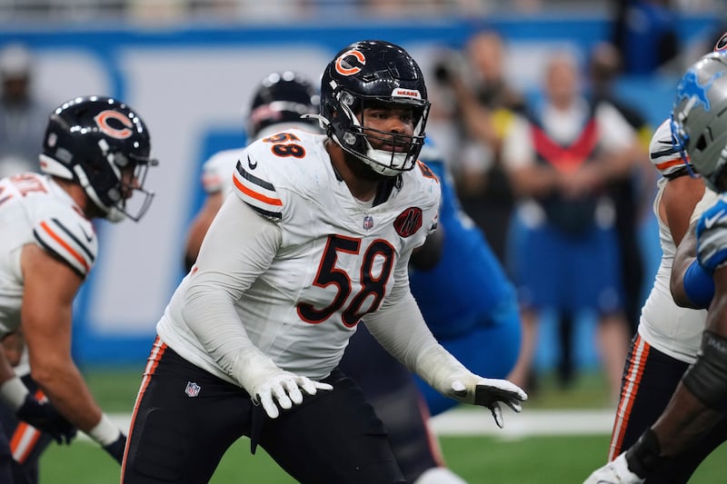 Chicago Bears offensive tackle Darnell Wright (58) plays against the Detroit Lions during an NFL football game in Detroit, Sunday, Sept. 14, 2025. (AP Photo/Paul Sancya)