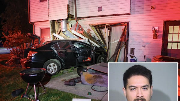Woodstock man left woman ‘drenched in blood’ before crashing into townhome, authorities say