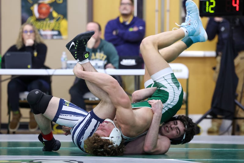 Coal City's Brody Widlowski wrestles Yorkville Christian's Austin Wadas-Luis, right, in the 150-pound championship match during the IHSA Class 1A Coal City Sectional on Saturday, Feb. 14, 2026.