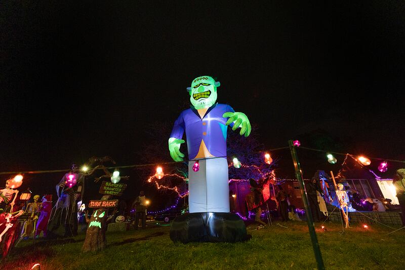 Frankenstein’s Monster lords over this packed house on Marsha Lane in Rock Falls. Lots of crazy characters getting into all sorts of mischief here.