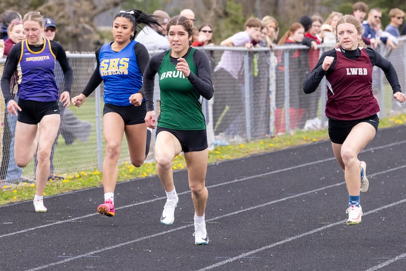 Lily Bosnich of St. Bede Academy leads the pack during one of her races during the Rollie Morris Invite on April 19, 2025 at Hall High School.