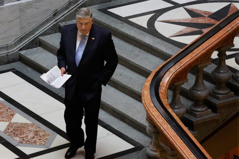 Illinois state Sen. Kirk Dillard, R-Westmont, leaves the Senate chambers at the state Capitol Friday, May 30, 2014, in Springfield Ill. (AP Photo/Seth Perlman)