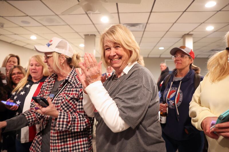 Manteno mayor-elect Annette LaMore reacts as vote totals show her in the lead on Tuesday night during at a watch party at the Manteno American Legion.