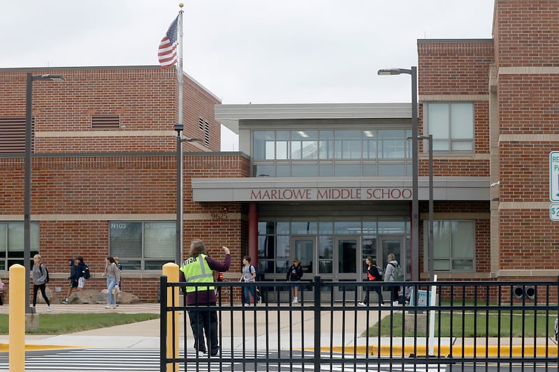 Students leave Marlowe Middle School on Thursday, Oct. 12, 2023. The Huntley Community District 158 board at its Sept. 21 meeting voiced concerns about the Secretary of State’s library grant program.