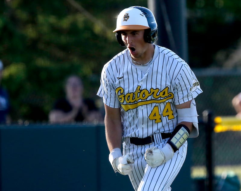 Crystal Lake South's Michael Silvius celebrates as he runs the bases after hits a two run game winning home run during a Fox Valley Conference baseball game against Prairie Ridge on Friday, May 15, 2026, at Crystal Lake South High School.