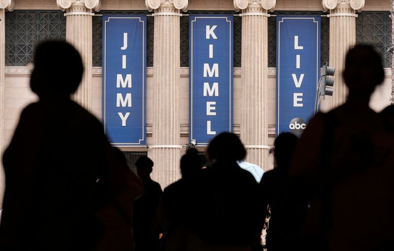 People walk by the Jimmy Kimmel Live studio on Hollywood Blvd., Wednesday, Sept. 17, 2025, in Los Angeles. (AP Photo/Chris Pizzello)
