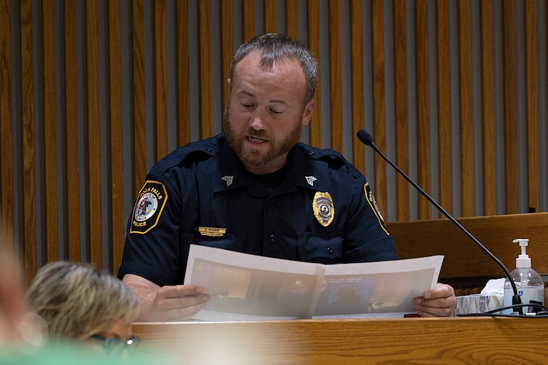 Rock Falls police officer Ryan McKanna reviews stills taken from his body cam while working the fatal fire. McKanna testified Tuesday, July 16, 2024, during the trial of Steven W. Coleman, who is accused of setting the fire that killed three.