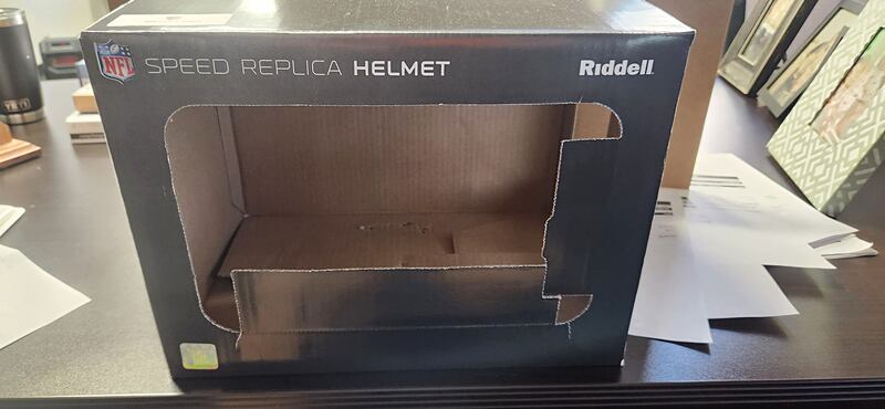 A Chicago Bears signed helmet, destined as an auction item for the Dixon Schools’ Stupor Bowl, has gone missing and is presumed to have been stolen. All that remains is an empty box.