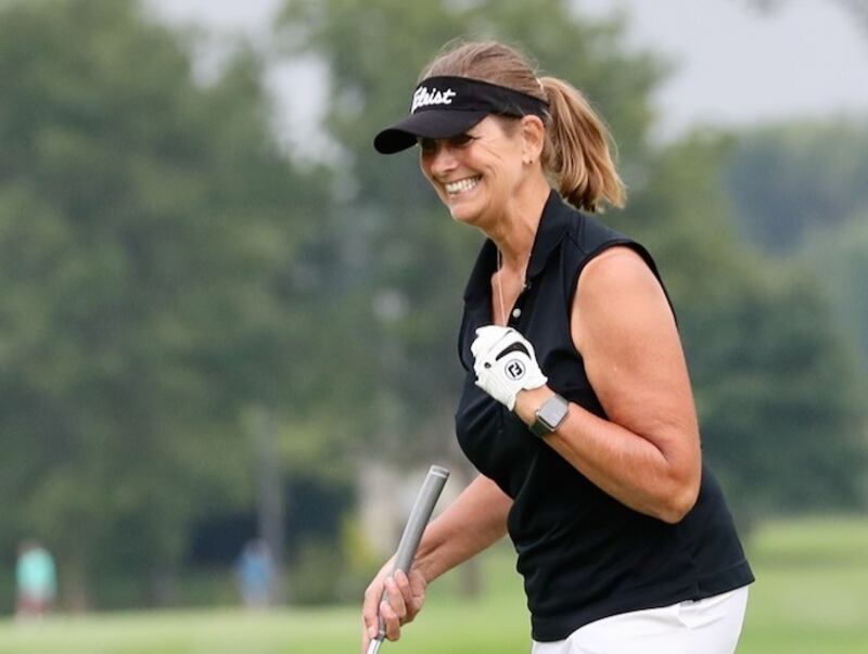 Kirsten McLendon celebrates after beating Karen Anderson in a three-hole playoff to win the Illinois Valley Women's Golf Invitational on Sunday at Spring Creek Golf Course in Spring Valley.