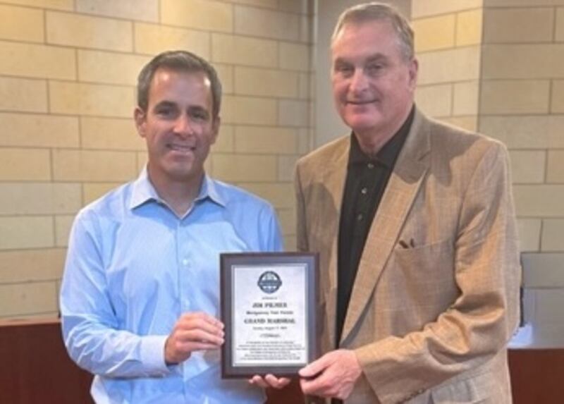 Montgomery Village President Matt Brolley (right) with Jim Pilmer, grand marshal of the 2025 Montgomery Fest parade.