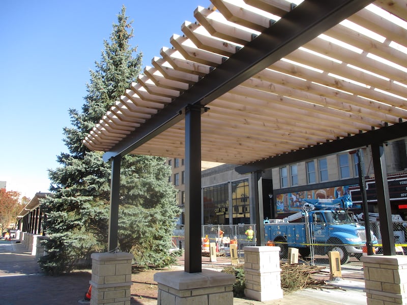 The shaded walkways on the Chicago Street edge of the new Joliet City Square will be open for the Light Up the Holidays Festival and Parade on Nov. 28. So will the area around the city Christmas tree. Nov. 15, 2025