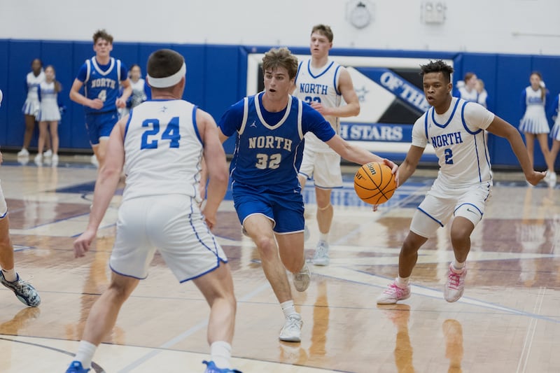 Wheaton North's Ben Gillmar runs a play agains St. Charles North on Thursday, Jan. 29,2026 in St. Charles.