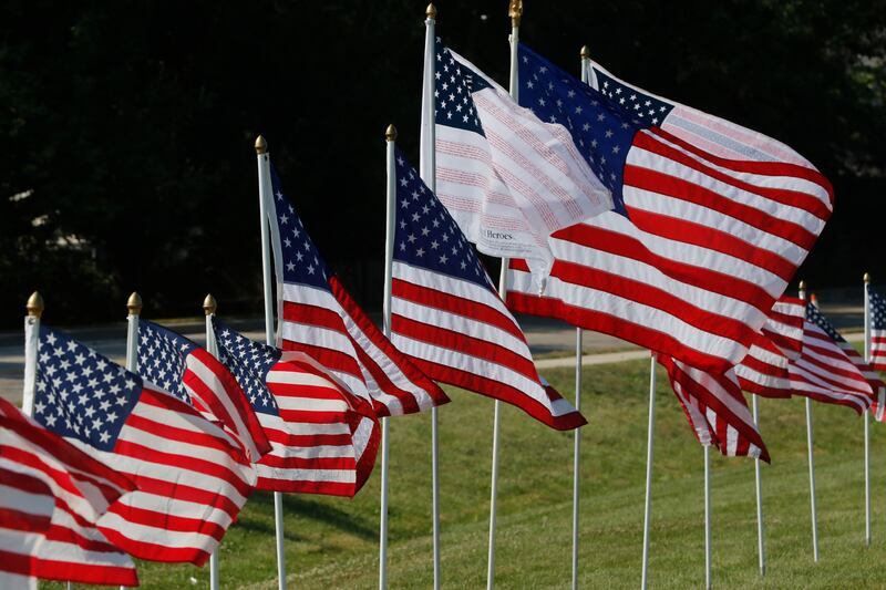 American flags, put up by True Patriots Care, surround McHenry Township Fire Protection District Station 2 on Johnsburg Road in Johnsburg on Thursday, Sept. 11, 2025. The Flags of Honor is on display at Station 2 through September 15. This exhibit honors the 343 brave firefighters who lost their lives during the tragic events of September 11, 2001, with each flag symbolizing their courage and sacrifice.