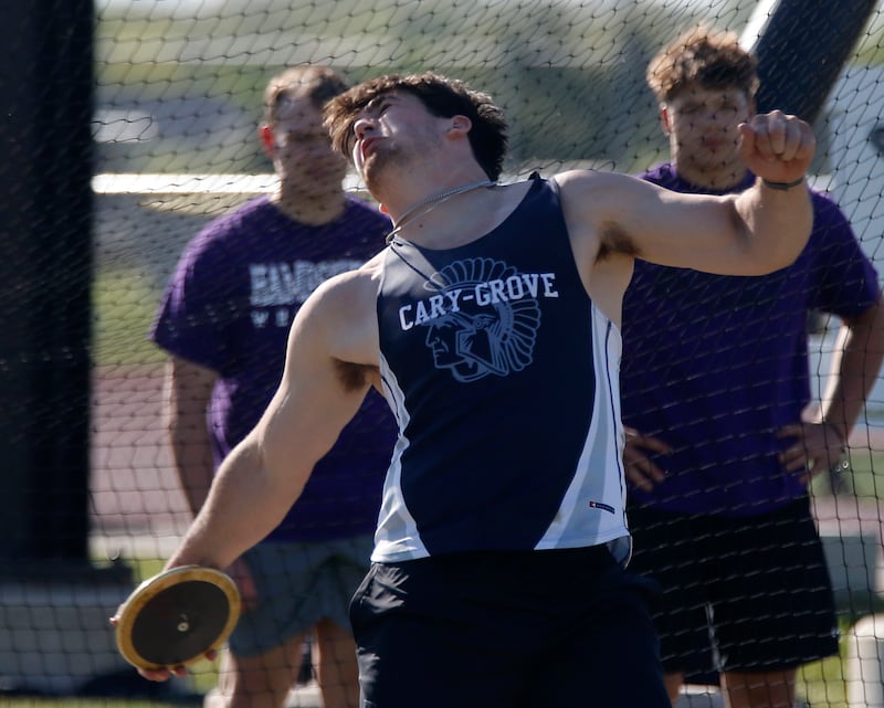 Cary-Grove's Logan Abrams competes in the discus during the Fox Valley Conference Boys Track and Field Meet on Thursday, May 14, 2026, at Huntley High School.