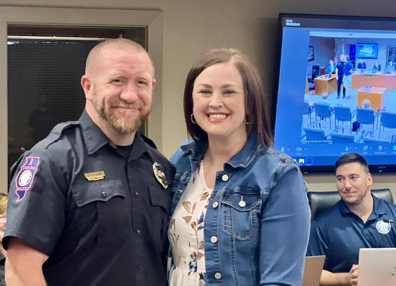 Shane Bland stands with his wife, Kelly, during the Sterling City Council meeting on Oct. 6, 2025, where he was promoted to deputy chief of operations for the Sterling Police Department.