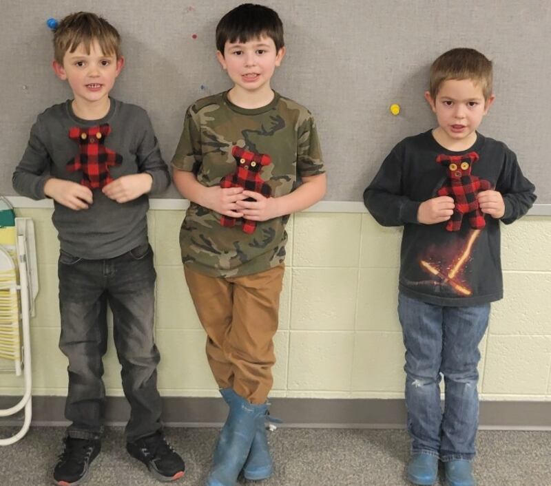 Pictured holding teddy bears are Colton Gipper, Finn Slattery and Theo Slattery.