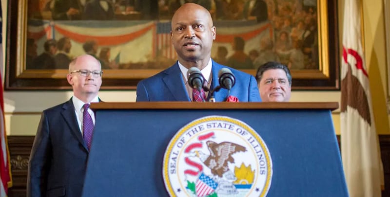 House Speaker Emanuel “Chris” Welch, D-Hillside, speaks at a news conference about the state budget alongside Senate President Don Harmon, left, and Gov. JB Pritzker, right, in May 2023 at the State Capitol.