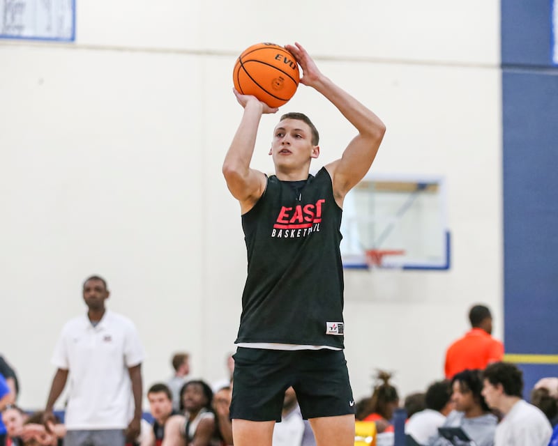 Glenbard East's Michael Nee (4) shoots a jumper in their Riverside-Brookfield Shootout basketball game. June 20, 2025 in Riverside.