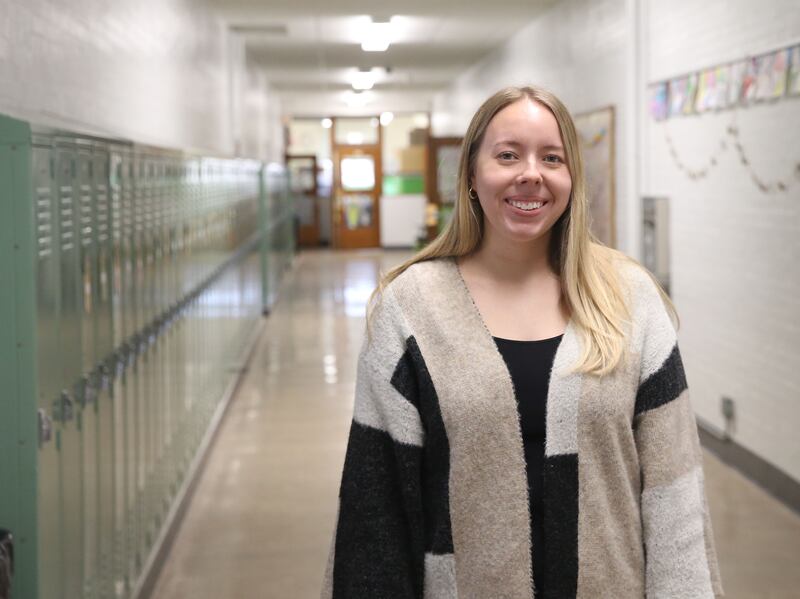 Cheyenne Timm poses for a photo outside her classroom on Thursday, April 3, 2025 at Marseilles Elementary School.