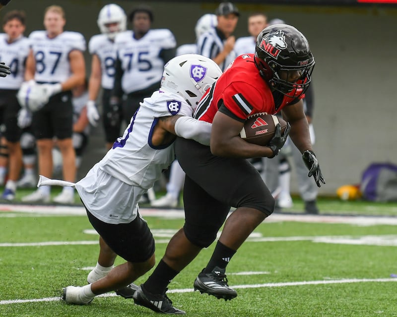 Northern Illinois University's running back Chavon Wright (10) gets a first down during the first half of the game before being tackled by Holy Cross on Saturday Aug. 30, 2025, held at Huskie Stadium in DeKalb.