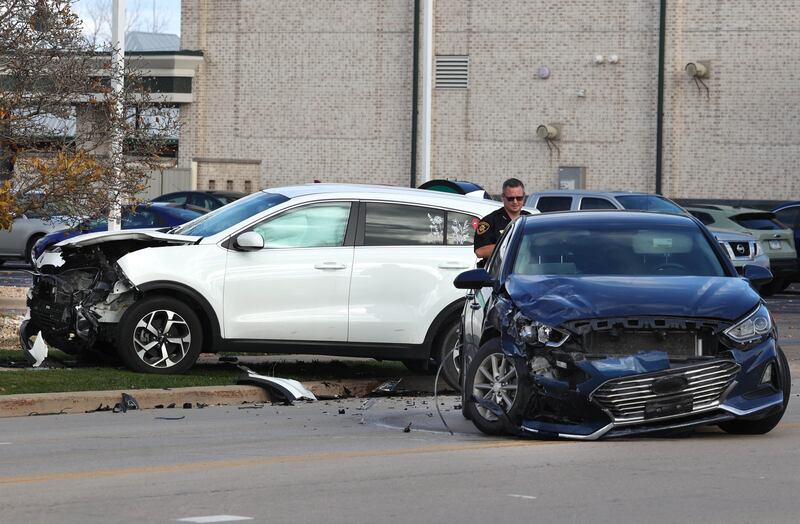 Two vehicles involved in a crash Tuesday, Nov. 19, 2024, sit in the westbound lanes of Bethany Road near DeKalb Avenue in Sycamore.