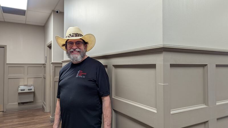 Tom Grotovsky, owner of The Curator’s Café inside the inside the American Legion Post 1080 in Joliet, is seen moving between dining room and kitchen on Bluegrass Burger Bash Day, Wednesday, April 30, 2025.