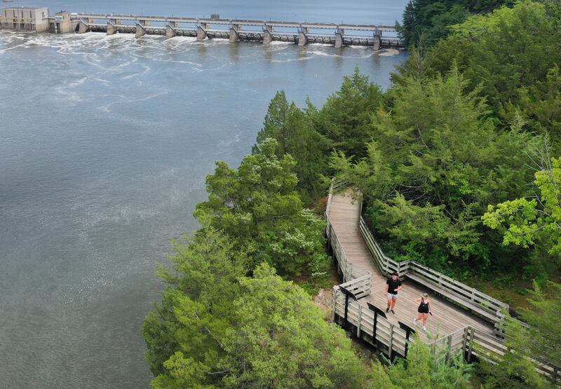 A couple walks on the pathway on top of Starved Rock on Thursday, July 24, 2025 at Starved Rock State Park. Starved Rock State Park is on pace for 2 million visitors. Matthiessen State Park is also poised for a record.