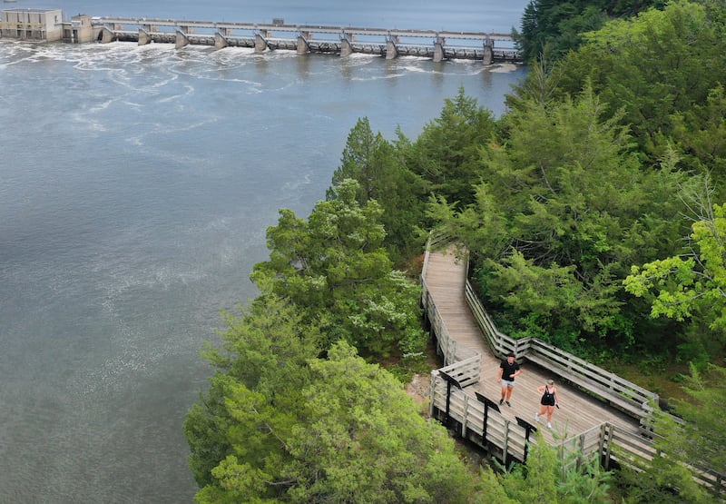 A couple walks on the pathway on top of Starved Rock on Thursday, July 24, 2025 at Starved Rock State Park. Starved Rock State Park is on pace for 2 million visitors. Matthiessen State Park is also poised for a record.