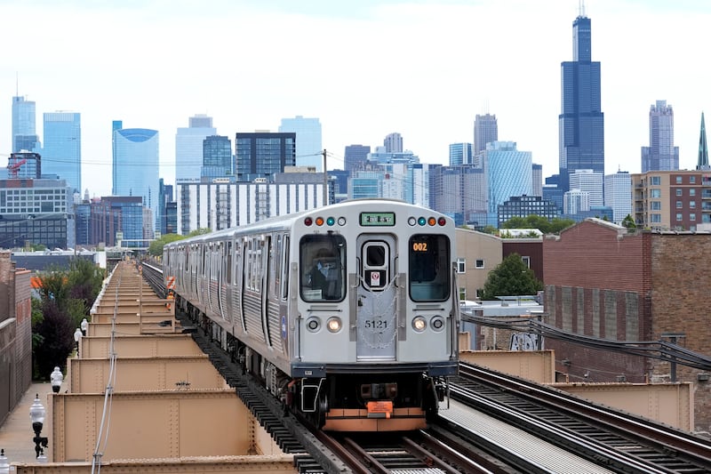 FILE - A Chicago Transit Authority train pulls into the new Damen Ave. station just two blocks from the United Center, Aug. 12, 2024. (AP Photo/Charles Rex Arbogast, File)