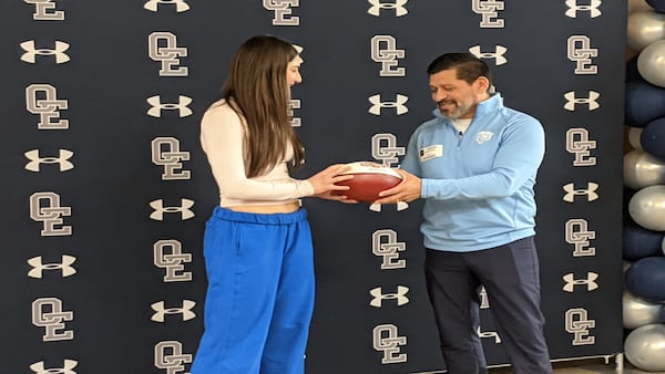 Chicago Bears present Oswego East’s flag football quarterback with community award