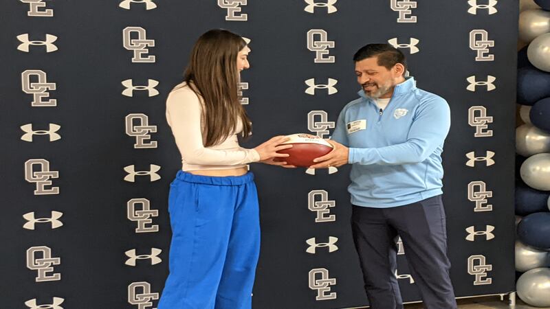 Chicago Bears present Oswego East’s flag football quarterback with community award