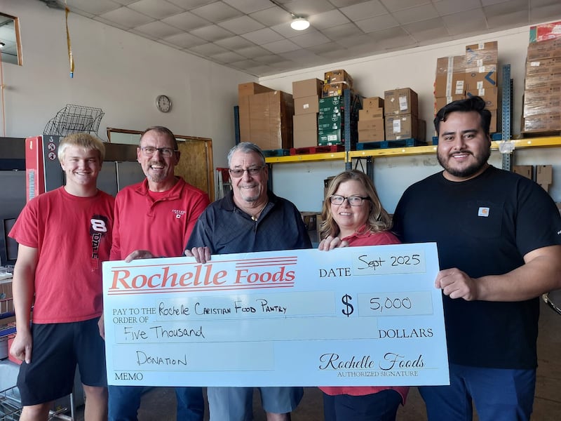 Rochelle Foods recently presented a $5,000 donation to the Rochelle Christian Food Pantry. RCFP thanked Hormel, Rochelle Foods’ owner, and its local employees. Pictured are RCFP volunteer Gavin, Rochelle Foods Plant Manager Tracy Brown, RCFP Board President Cal Jacobs, Jennifer Dewey (Rochelle Foods) and Angel Sanchez (Rochelle Foods).
