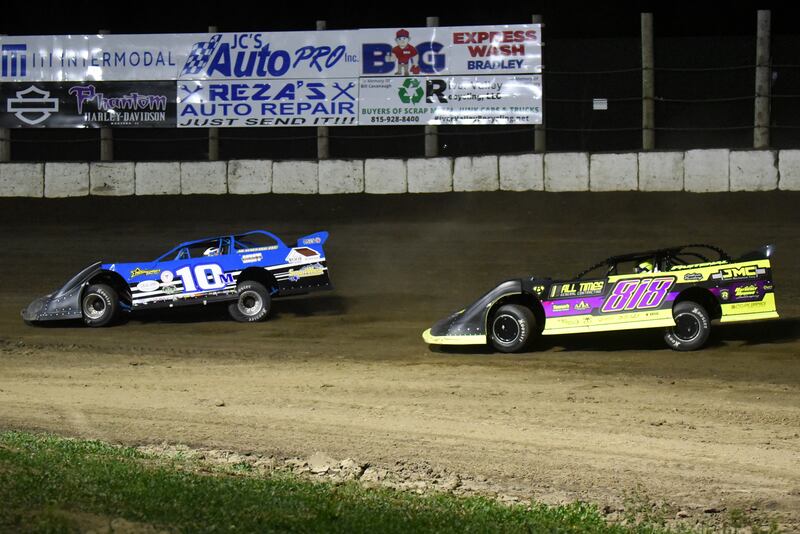 Austin McCarty, left, holds off Matt Hammond in the final laps of the pro late model feature at Kankakee County Speedway Friday, May 16, 2025.