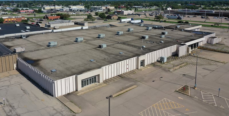 An aerial view of the former Sears property inside the Peru Mall on Monday, July 28, 2025 in Peru. The 98,000 square-foot building will be auctioned off on Monday, Aug. 4, 2025. The lot is just over 8 acres. Crexi is handling the auction service.