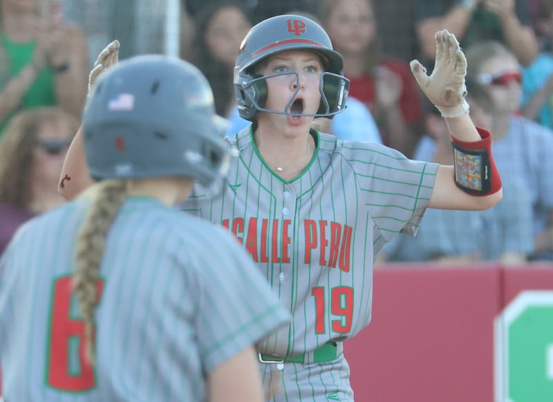 L-P's Lydia Steinbach reacts after scoring a run during the Class 3A Sectional semifinal game on Tuesday, May 26, 2026 at the L-P Athletic Complex in La Salle.