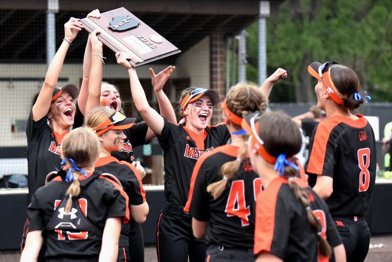 Members of the Beecher softball team celebrate with their Class 2A Seneca Sectional championship plaque after defeating Seneca 1-0 Friday, May 30, 2025, in Seneca.