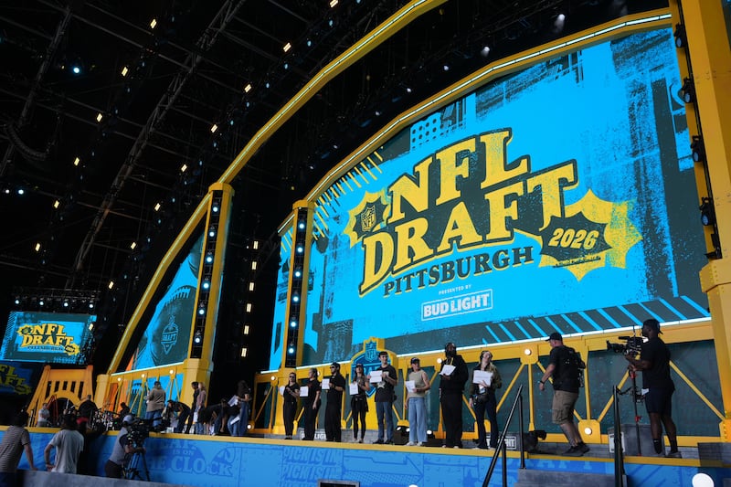 People rehearse ahead of the NFL football draft, Wednesday, April 22, 2026, in Pittsburgh. (AP Photo/Gene J. Puskar)