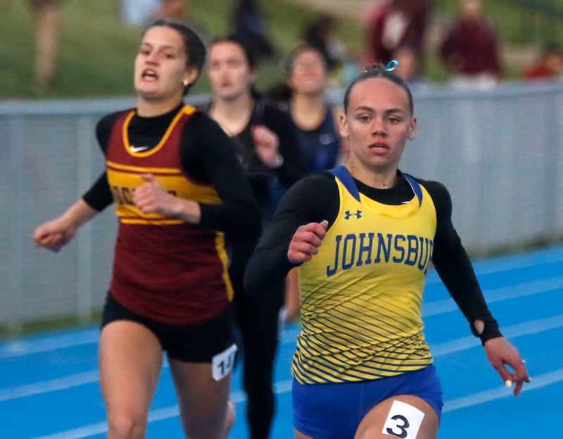 Johnsburg’s Hope Klosowicz wins the 400 meter run during the Kishwaukee River Conference Girls Track and Field Meet on Tuesday, May 5, 2025, at Woodstock High School.