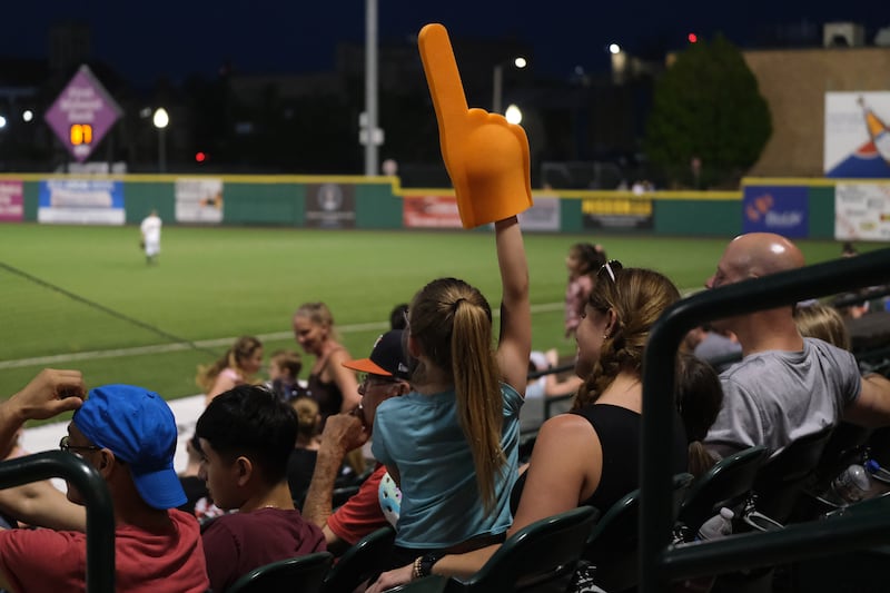 A fan wears a foam finger while cheering on the Joliet Slammers at the home opener against the Ottawa Titans. Friday, May 13, 2022, in Joliet.