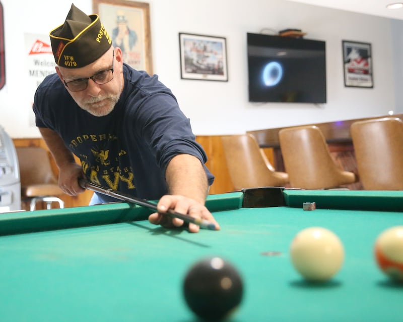 Veteran Jason Donohue, plays pool on Friday, Oct. 17 2025 at the VFW Hall in Mendota.