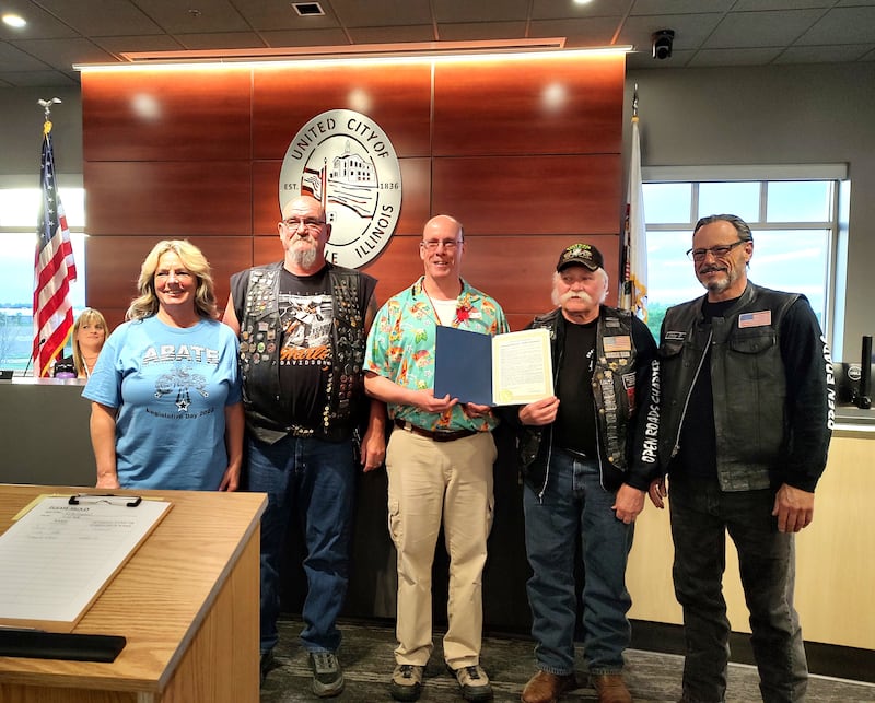 Pictured, Sharyl Mataya, Open Roads ABATE President Sam Mataya, Yorkville Mayor John Purcell, Cliff Oleson, and Jimmy Durovec at the April 28 City Council meeting.