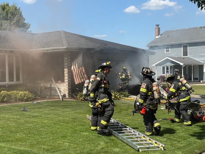 Lockport firefighters work to put out a structure fire in the 500 block of Stephanie Drive in Lockport on Tuesday, September 2, 2025.