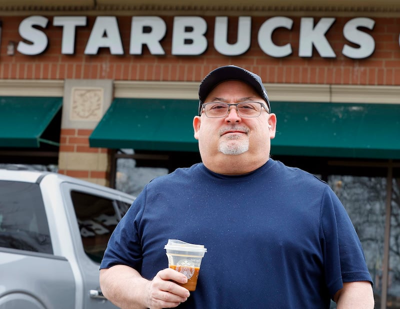Chuck Dungelo at his favorite Starbucks Friday, April 4, 2025 in Bartlett Ill. Dungelo was one of the first and worst COVID cases in our area.