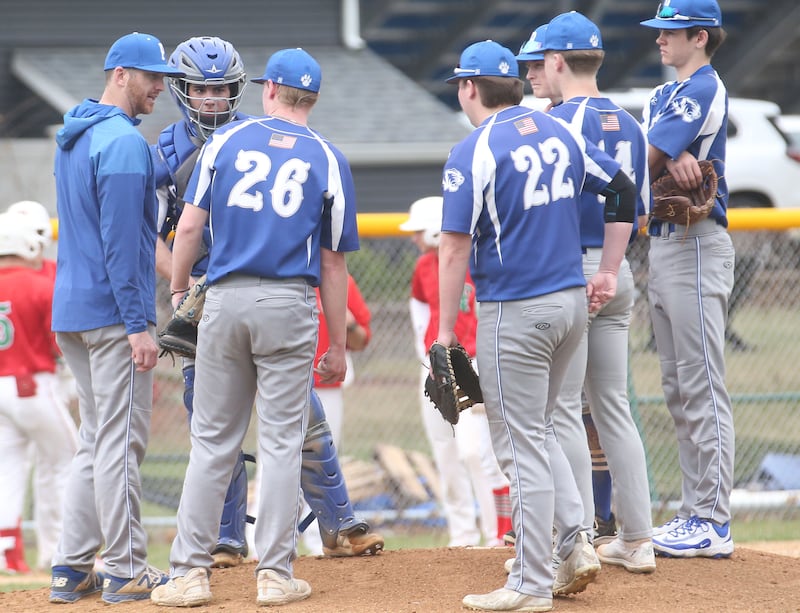 Princeton head baseball coach Patrick Smith talks to his team on the mound while facing L-P on Saturday, March 29, 2025 at Princeton High School.