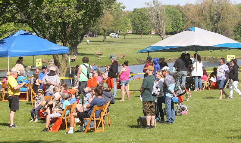 A large crowd gathers during the 25th annual Kids Fishing Expo on Saturday, May 10, 2025 at Baker Lake in Peru.