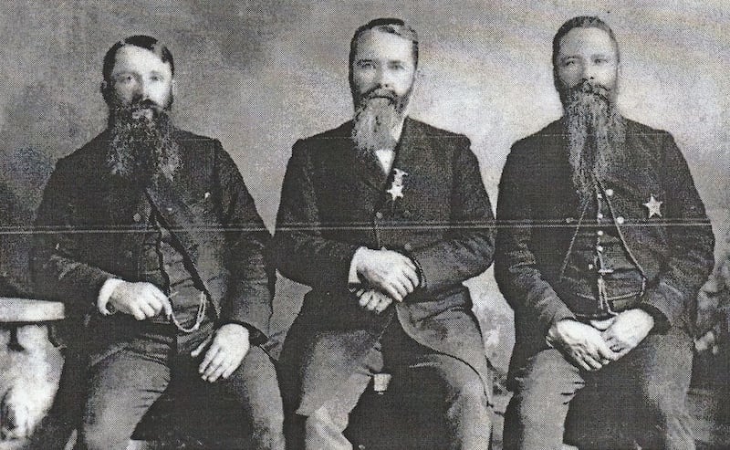 Robert Huston (right) with his brothers, William and Thomas.